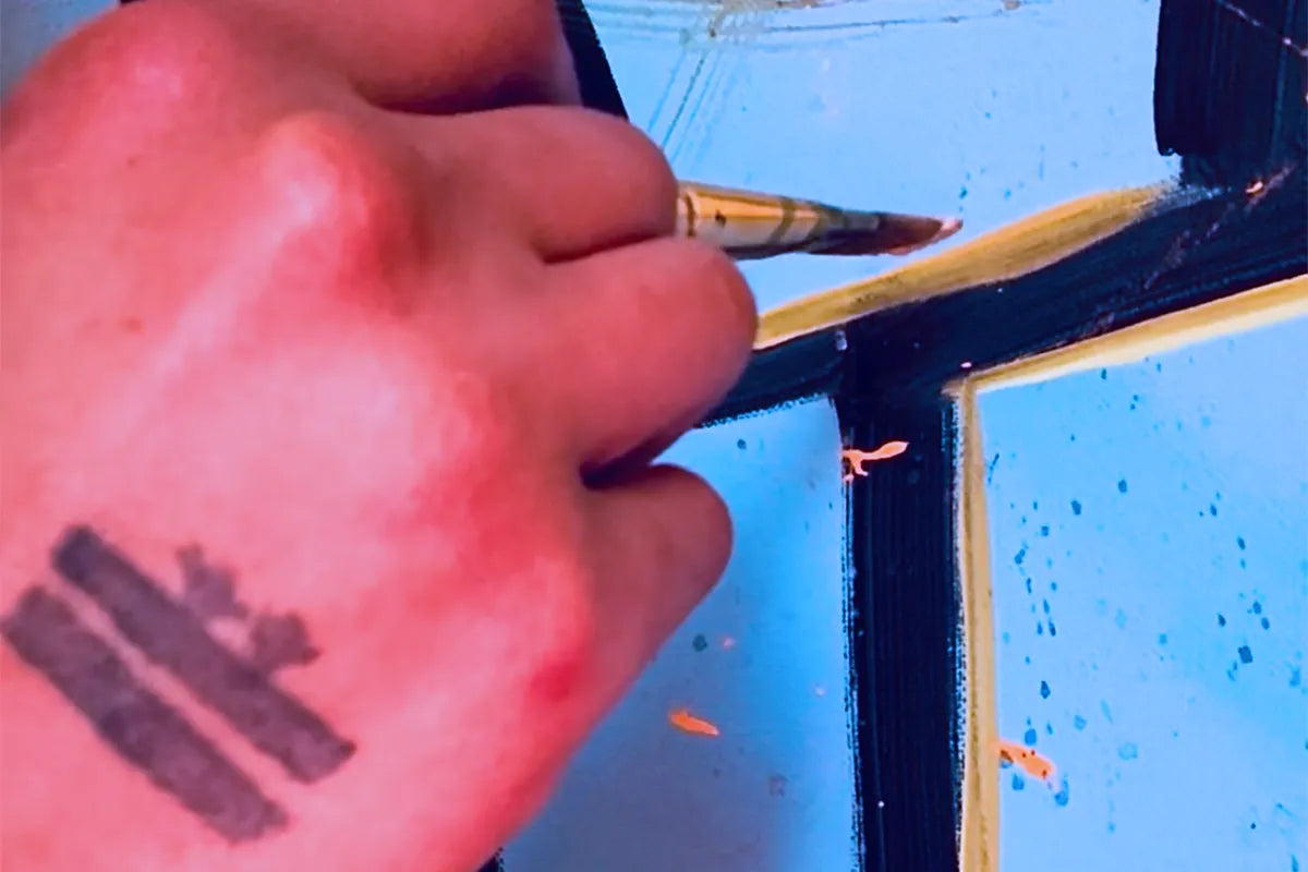 Local artist Jasmine Jackson hand-painting the artwork 'Patchy' live in her FREEBRD studio.