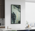 Modern interior with a Freebrd "Tugough" framed abstract artwork on a white wall.