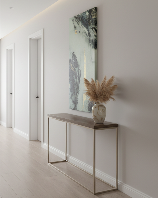 Modern interior with a console table against a wall featuring Freebrd’s “Tugough” abstract wall art