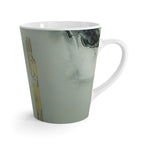 White mug with marbled design and gold accents 
