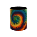 Colorful spiral-patterned mug with black ceramic handle and insides
