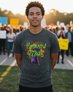 Person wearing a Freebrd t-shirt with 'Human Rights' text at a rally event