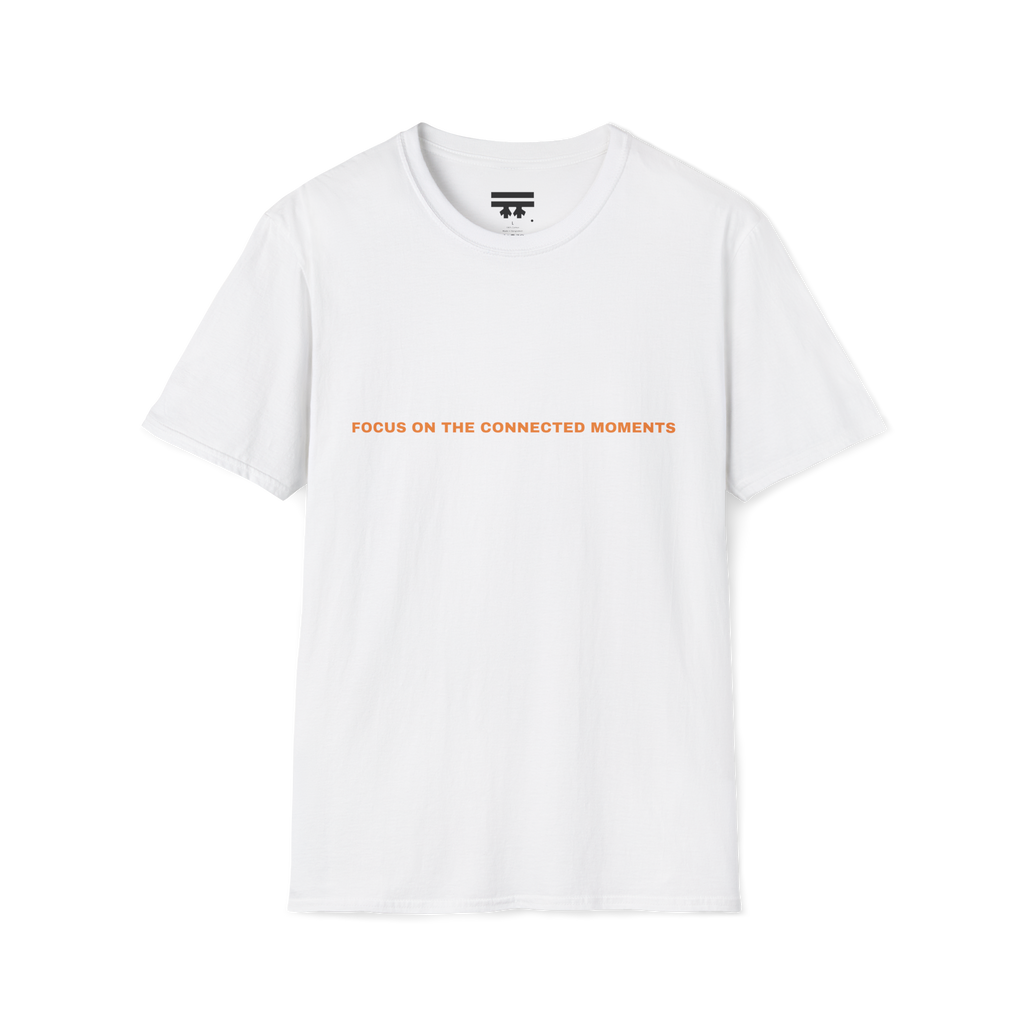 White t-shirt with 'Focus on the connected moments' in orange text