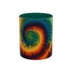Colorful spiral-patterned mug with green ceramic handle and insides

