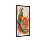 Side view of the “Grid Riser Rhino” Abstract Framed Art by FREEBRD on a 1.25” canvas with a 16" x 32” Vertical frame, showcasing vibrant orange, red, green and black acrylic textures with hints of vivid yellow, coral and gold, framed in a black wood FSC certified frame. 