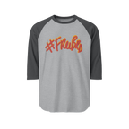 100% ring-spun cotton Raglan Shirt with heather grey torso and heather charcoal sleeves and hashtag Freebrd in retro crimson red text with a mustard yellow shadow 