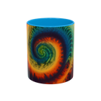 Colorful spiral-patterned mug with light blue ceramic handle and insides

