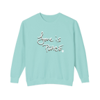 Chalky mint colored sweatshirt with 'Love is Peace' white floating chocolate shadowed text  