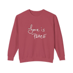 Crimson sweatshirt with 'Love is Peace'  in white floating chocolate shadow text  