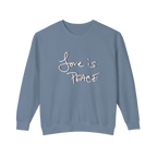 Blue Jean colored sweatshirt with 'Love is Peace' in white floating text with chocolate shadow