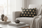 Modern Black & Beige Geometric Triangle Lumbar Pillow on a biege couch