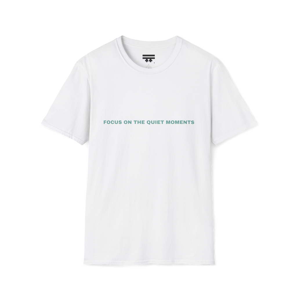 White t-shirt with 'Focus on the Quiet Moments' text on the front