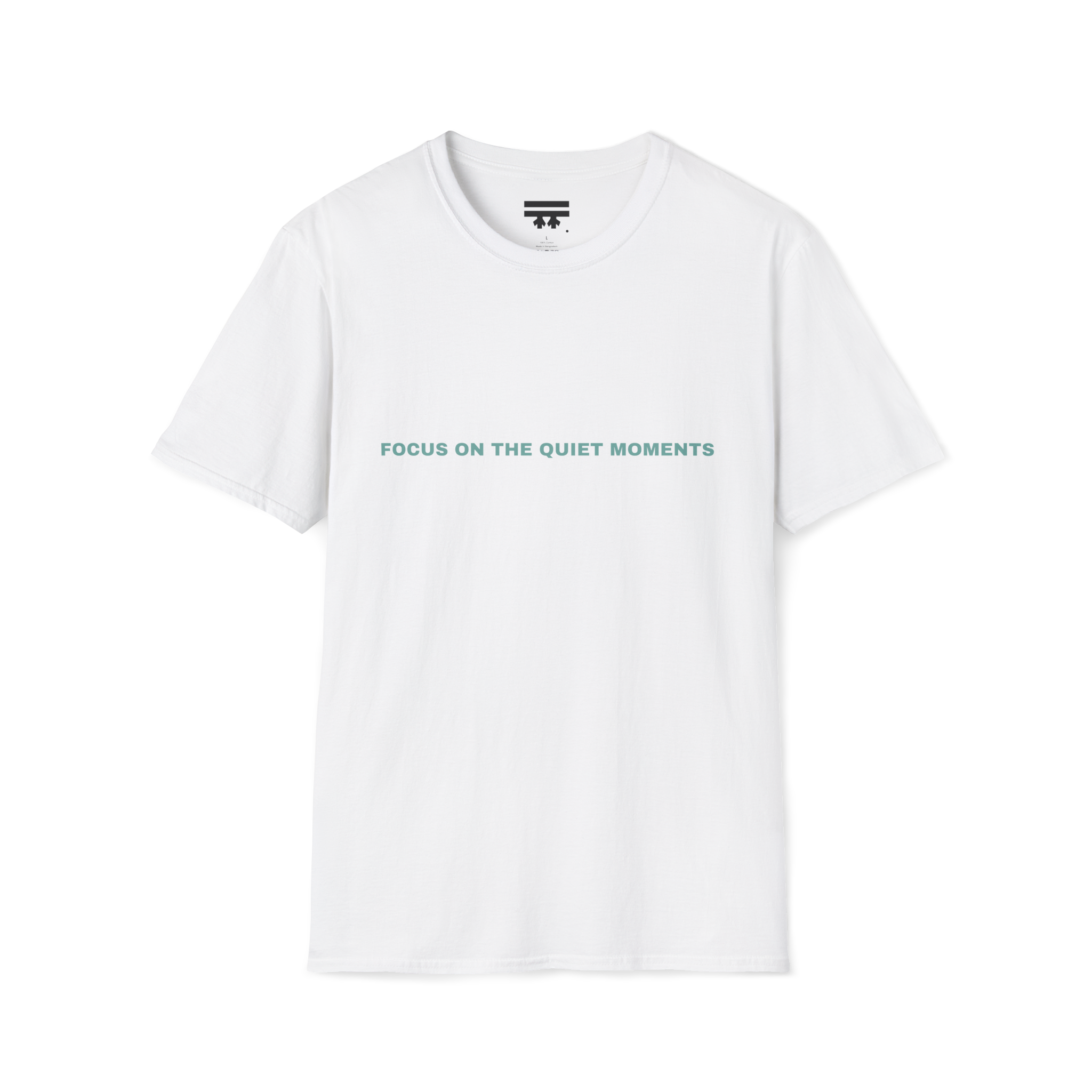 White t-shirt with 'Focus on the Quiet Moments' text on the front