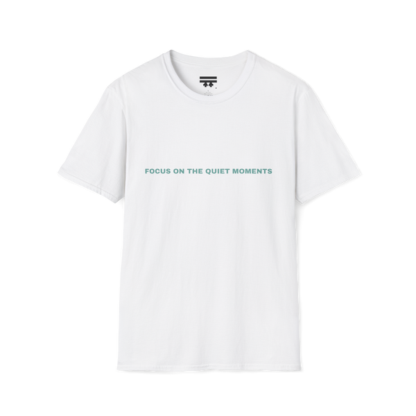 White t-shirt with 'Focus on the Quiet Moments' text on the front