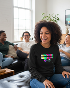 Woman wearing a black Freebrd designed Retro Glitch long sleeve, sitting on an autumn with friends  on the couch in a living room.