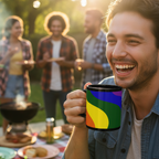 Man holding a Freebrd rainbow mug with friends in the background at a barbecue