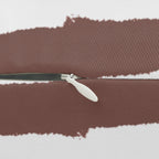 Abstract brown brushstroke lumbar pillow, zipper view.