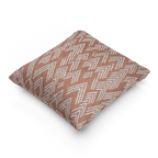 A side view of the Adore Pink Boho Ikat Woven Pillow showing an adore pink background and ivory white chevron ikat styled lines.