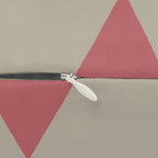 Adore pink triangle pattern lumbar pillow, zipper view.