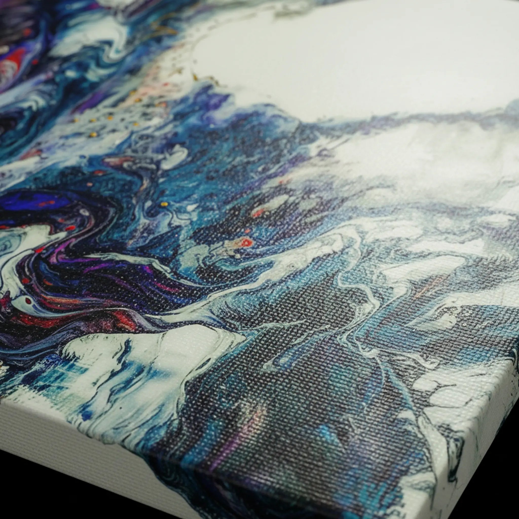 Close-up texture detail of "Afrostar" gallery-wrapped abstract canvas by FREEBRD — fluid pour art in navy, indigo, teal and white on premium DTF canvas with archival matte finish.
