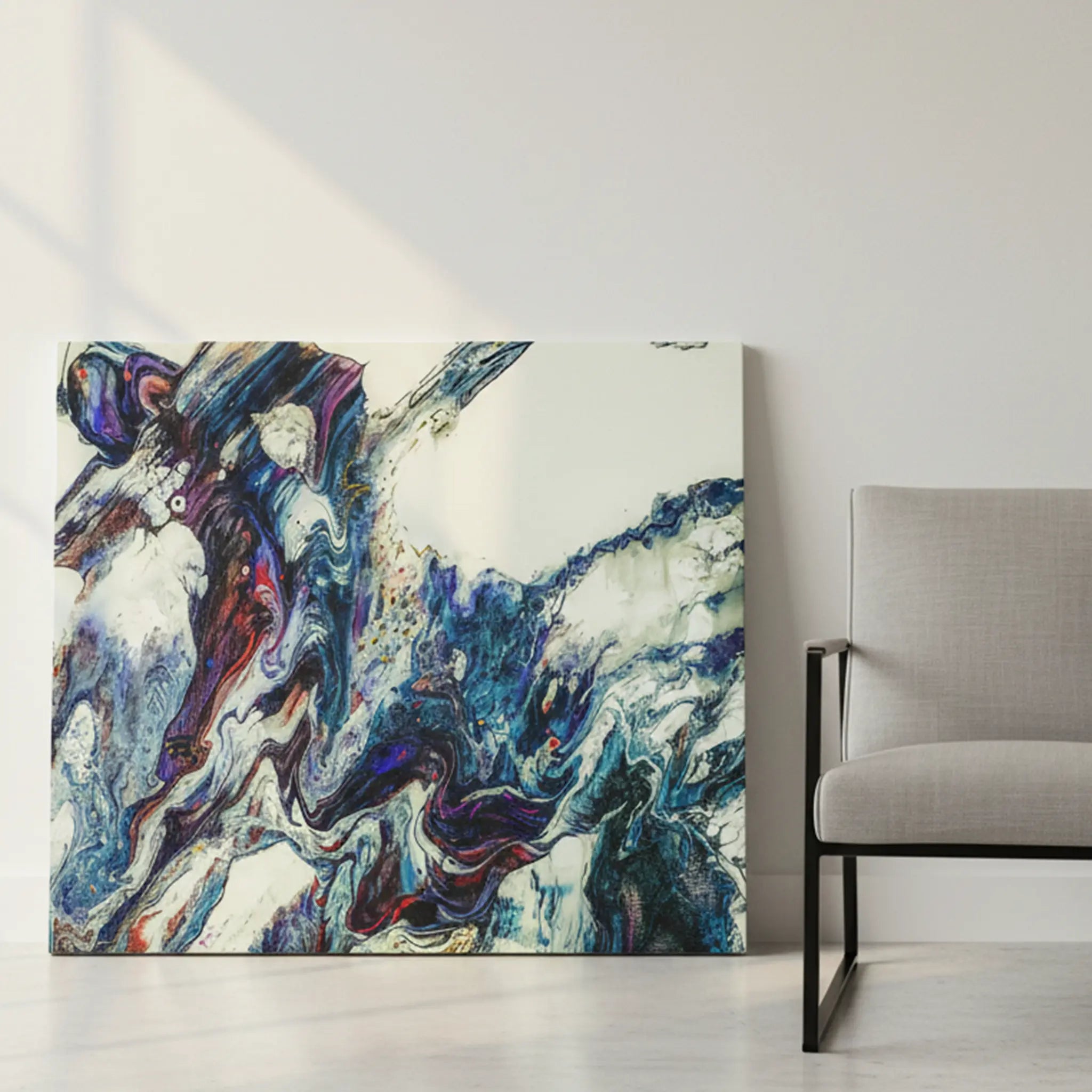 "Afrostar" 30x24 horizontal gallery-wrapped abstract canvas by FREEBRD leaning against a modern interior wall beside a contemporary accent chair — size reference for abstract wall art decor.