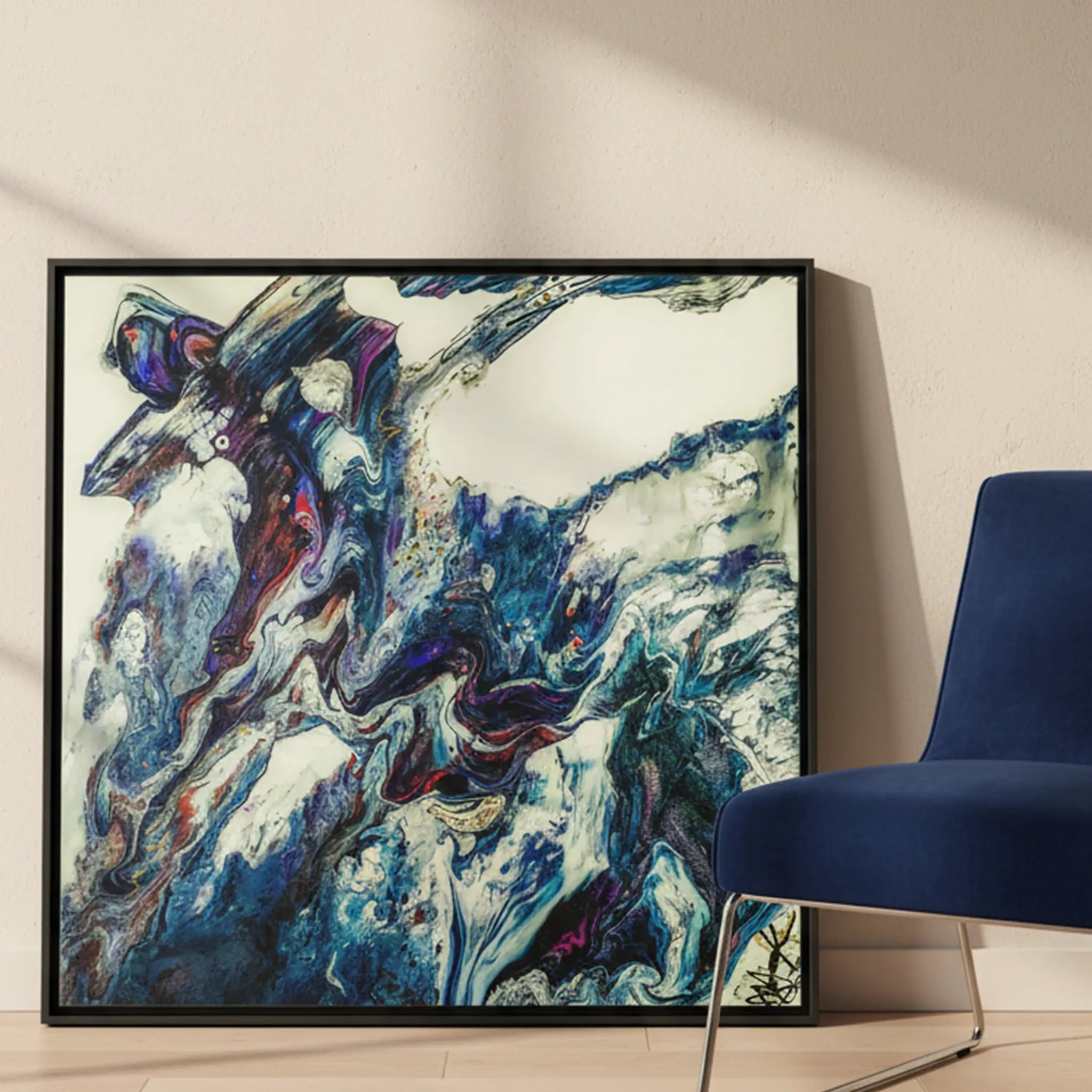 "Afrostar" 36x36 square framed abstract canvas by FREEBRD leaning against a modern interior wall beside a contemporary accent chair — size reference for large square framed wall art decor.