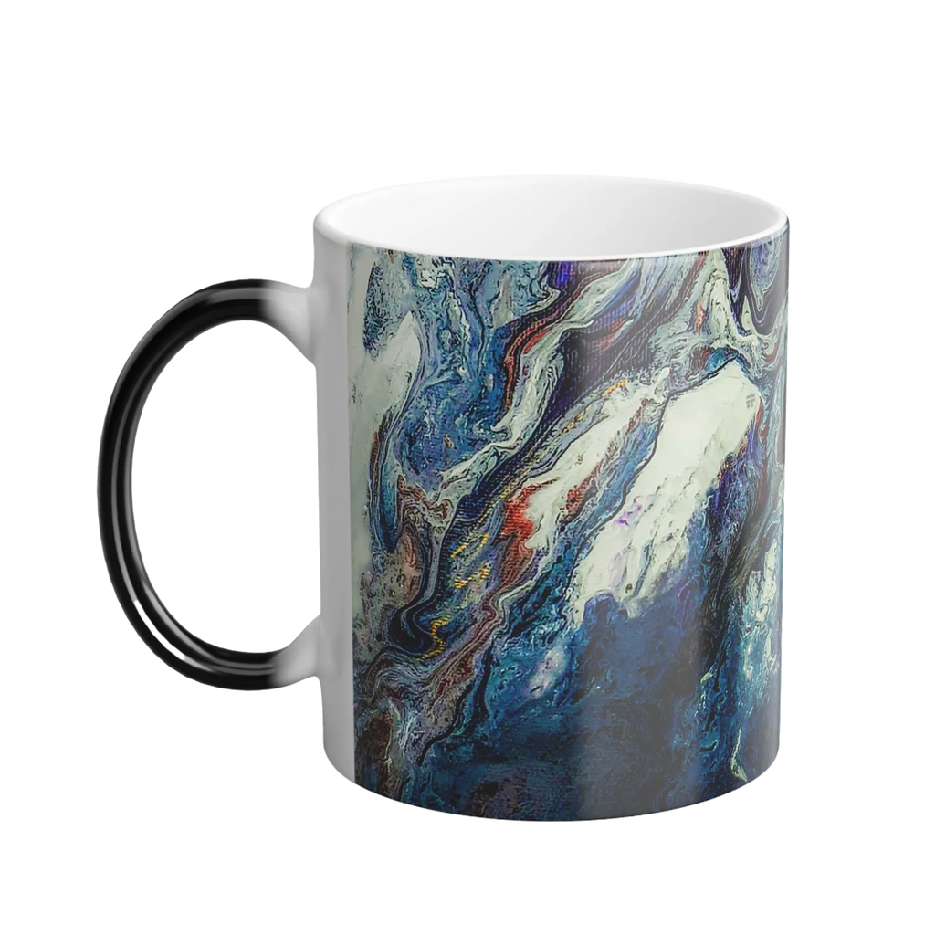 A left side view of the 11 oz abstract coffee cup showing the ‘Afrostar’ acrylic hand-poured canvas artwork design on the left side that displays navy, white, gold, magenta, black and shades of red acrylic paint textures wrapped around the cup, with a black c-shaped handle. 