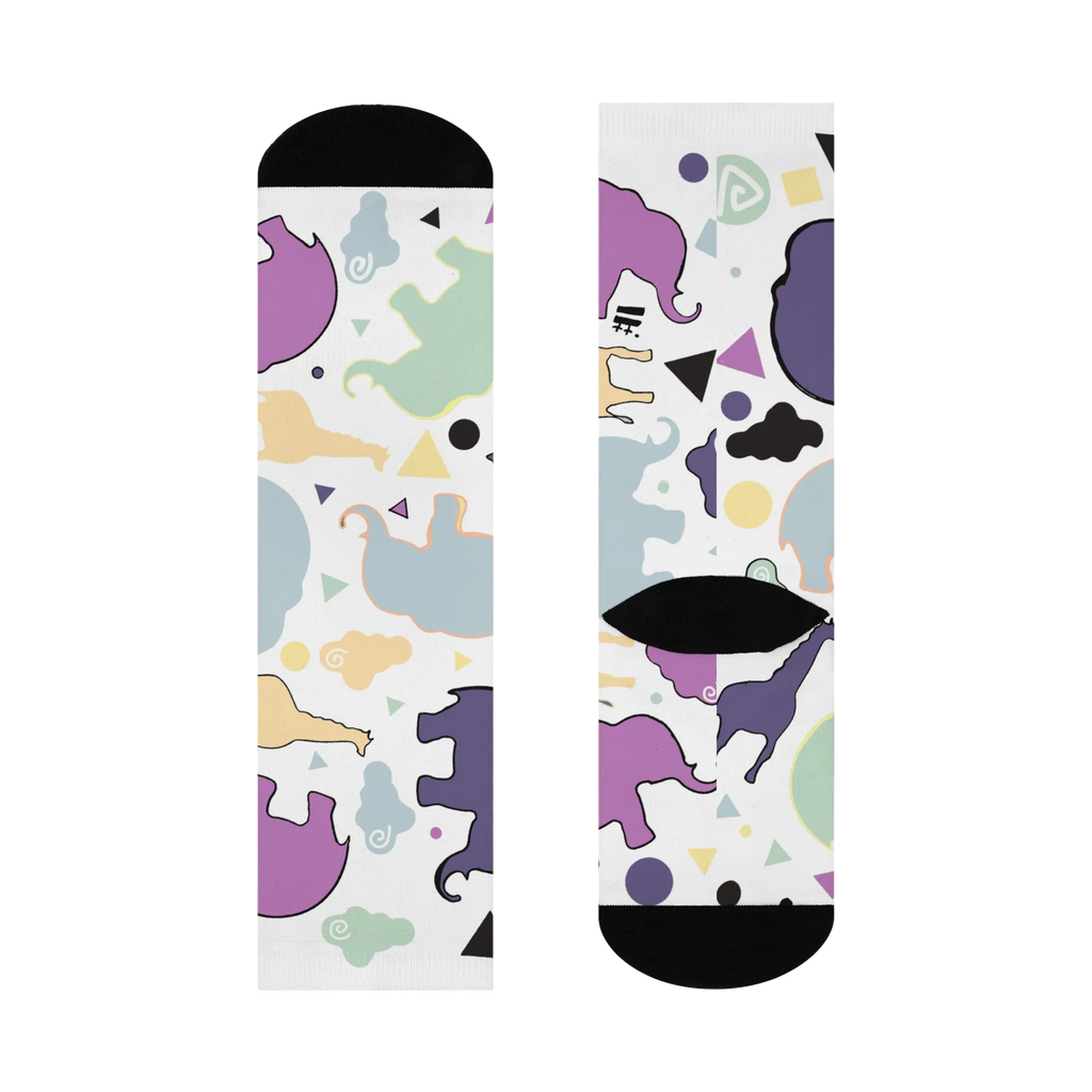 Animal Clouds Cushioned Mid-calf Socks. Featuring vibrant giraffe and elephant cloud prints in playful sea green, purple, and yellow colors with a black toe and heel.