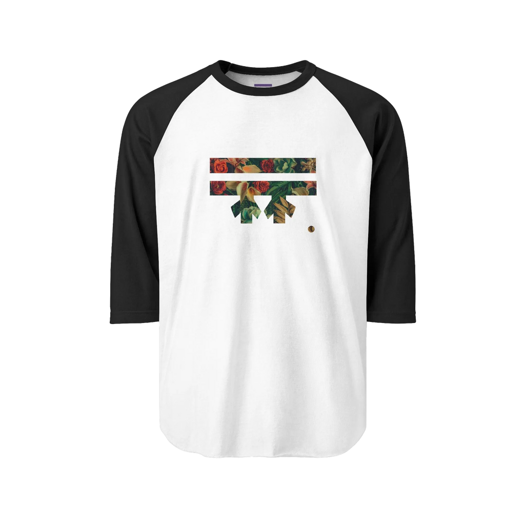 A white raglan tee with black sleeves featuring the hashtag Freebrd logo and two horizontal bars filled with an autumn botanical print of red roses, deep green leaves, and peach gold florals, with a small gold accent dot.