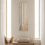 Unframed abstract vertical canvas art in hallway, terracotta orange and blush tones, earthy textures, warm morning light.
