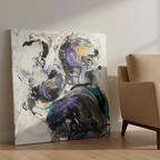 Freebrd "Biddy" unframed abstract canvas art, 36x36 square, 1.25" thick, leaning against modern interior wall beside accent sofa chair — size reference featuring white, deep purple, teal, gold, and charcoal fluid pour.