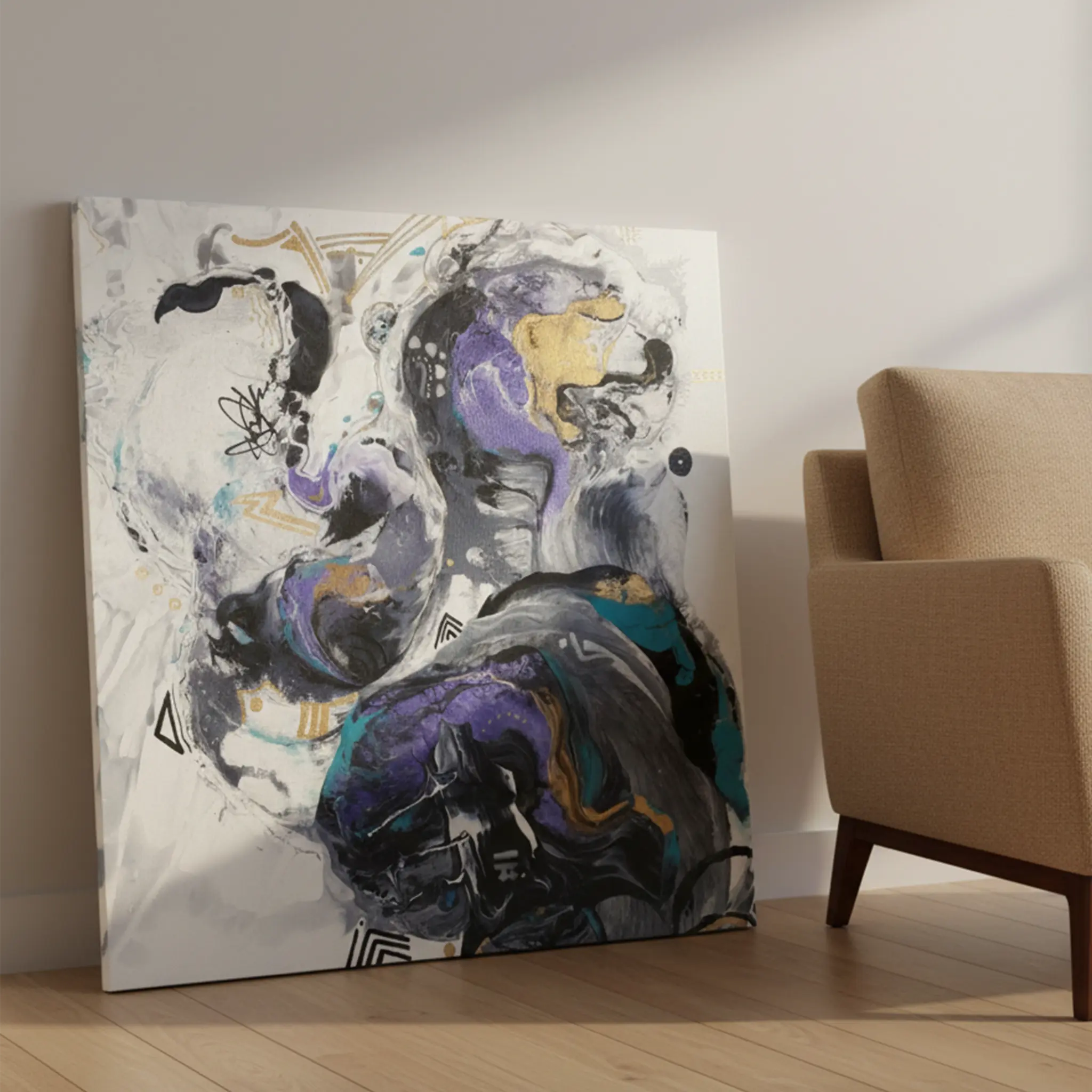 Freebrd "Biddy" unframed abstract canvas art, 36x36 square, 1.25" thick, leaning against modern interior wall beside accent sofa chair — size reference featuring white, deep purple, teal, gold, and charcoal fluid pour.