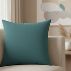 Bismark teal faux suede pillow styled on sofa, saturated teal home decor.
