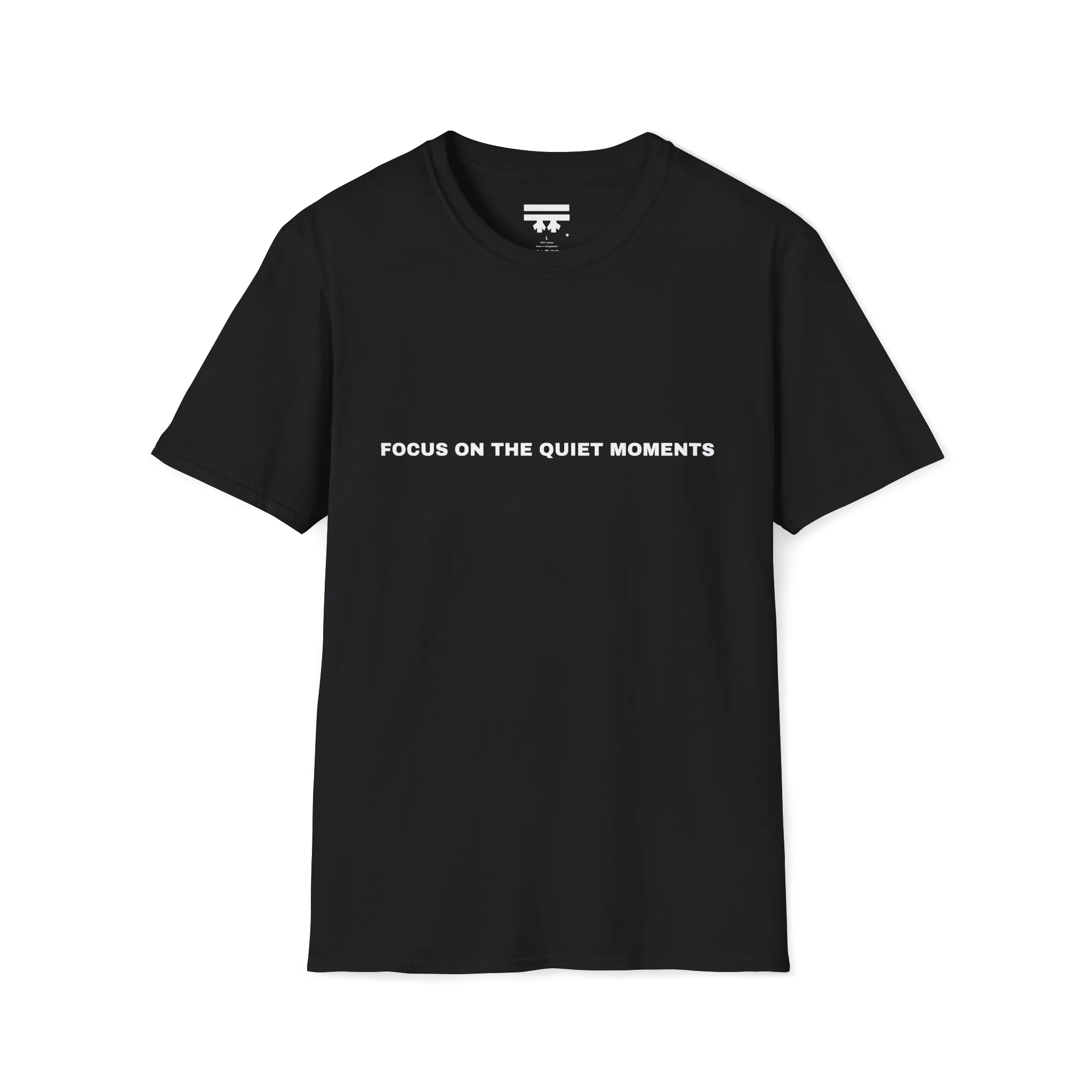 A black t-shirt with white Focus On The Quiet Moments text on the chest.