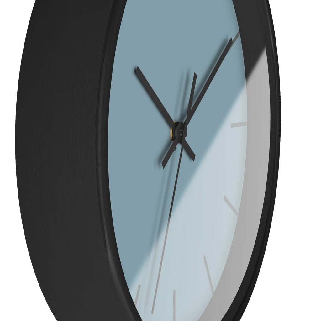 Danish blue minimalist wall clock with black wooden base, black hands, and dark grey markers, side view.