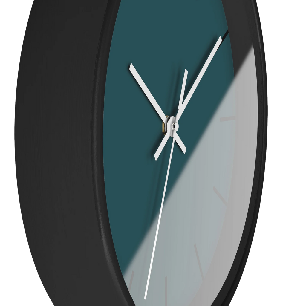 Abstract teal silent wall clock, black base, white hands, black markers, 10 inch, side view.