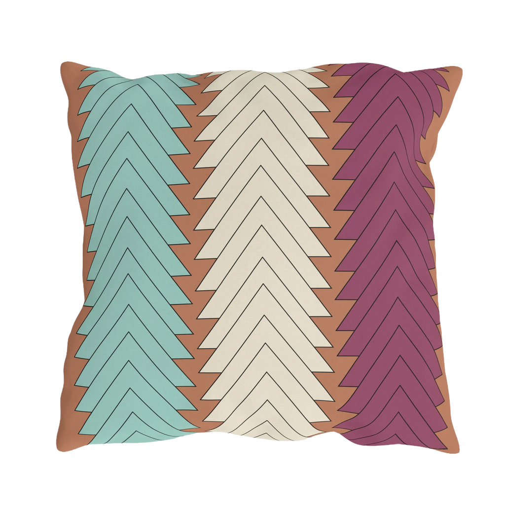Boho chevron outdoor pillow, teal cream magenta on terracotta ground, back view.