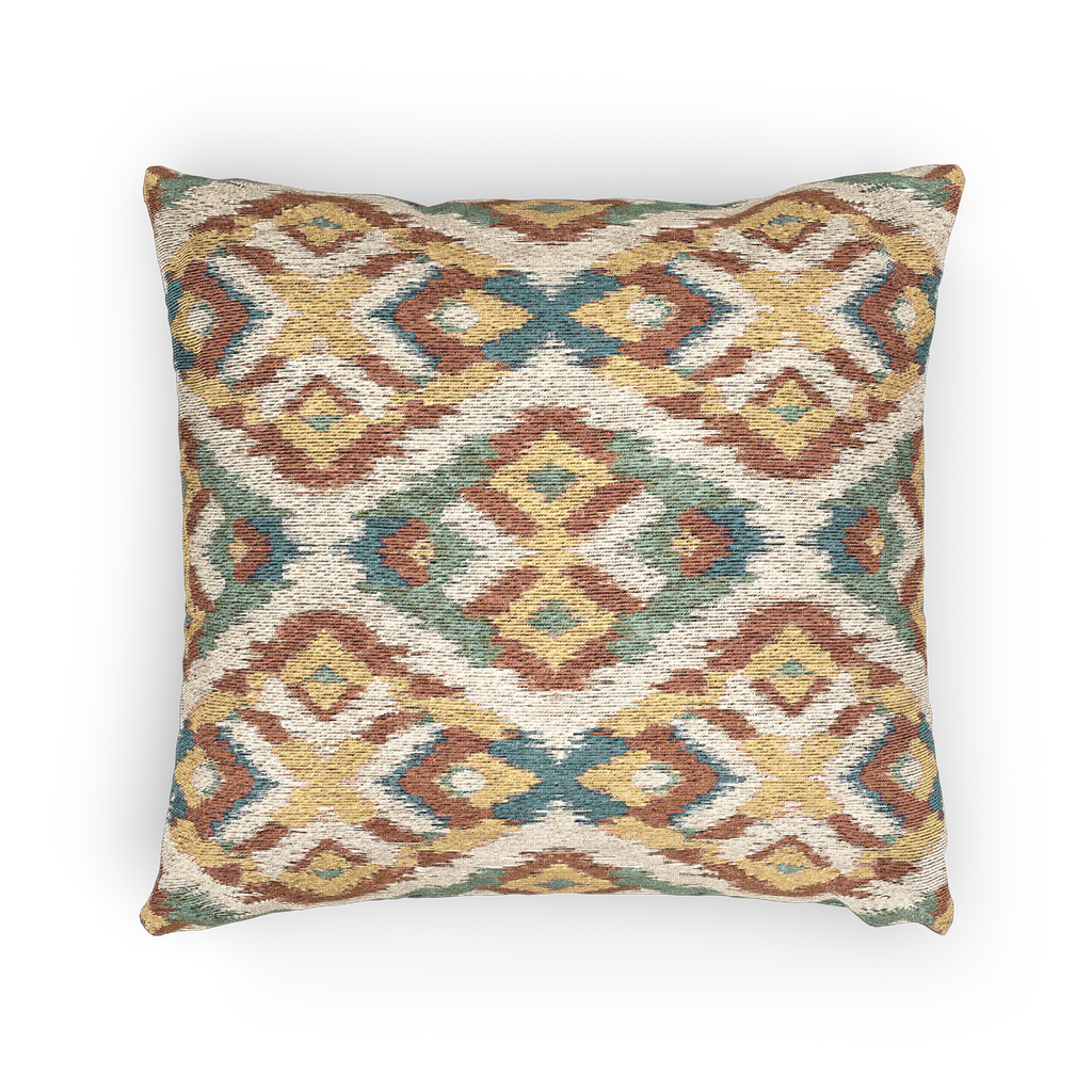 A horizontal view of the Boho Multicolored Arrow Ikat Woven Pillow showing an arrow ikat pattern in a dark terracotta, dark sage, abstract teal and mustard yellow on a beige background. 