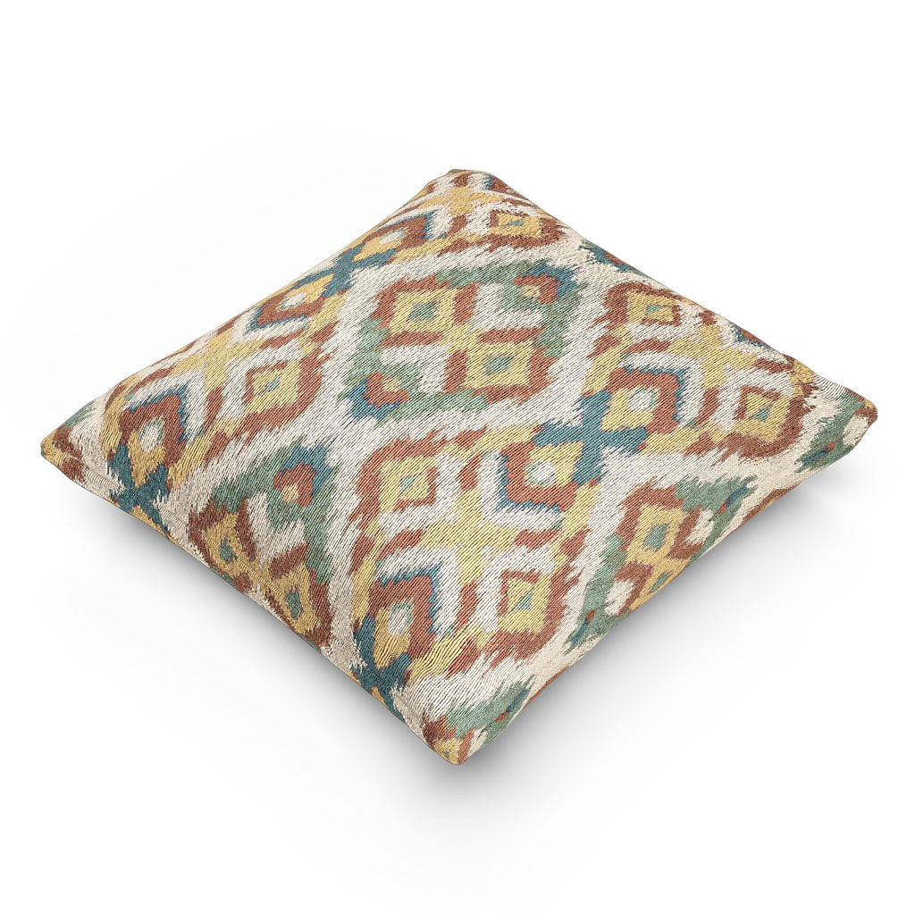 A side view of the Boho Multicolored Arrow Ikat Woven Pillow showing an arrow ikat pattern in a dark terracotta, dark sage, abstract teal and mustard yellow on a beige background. 