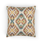 A front view of the Boho Multicolored Arrow Ikat Woven Pillow showing an arrow ikat pattern in a dark terracotta, dark sage, abstract teal and mustard yellow on a beige background. 
