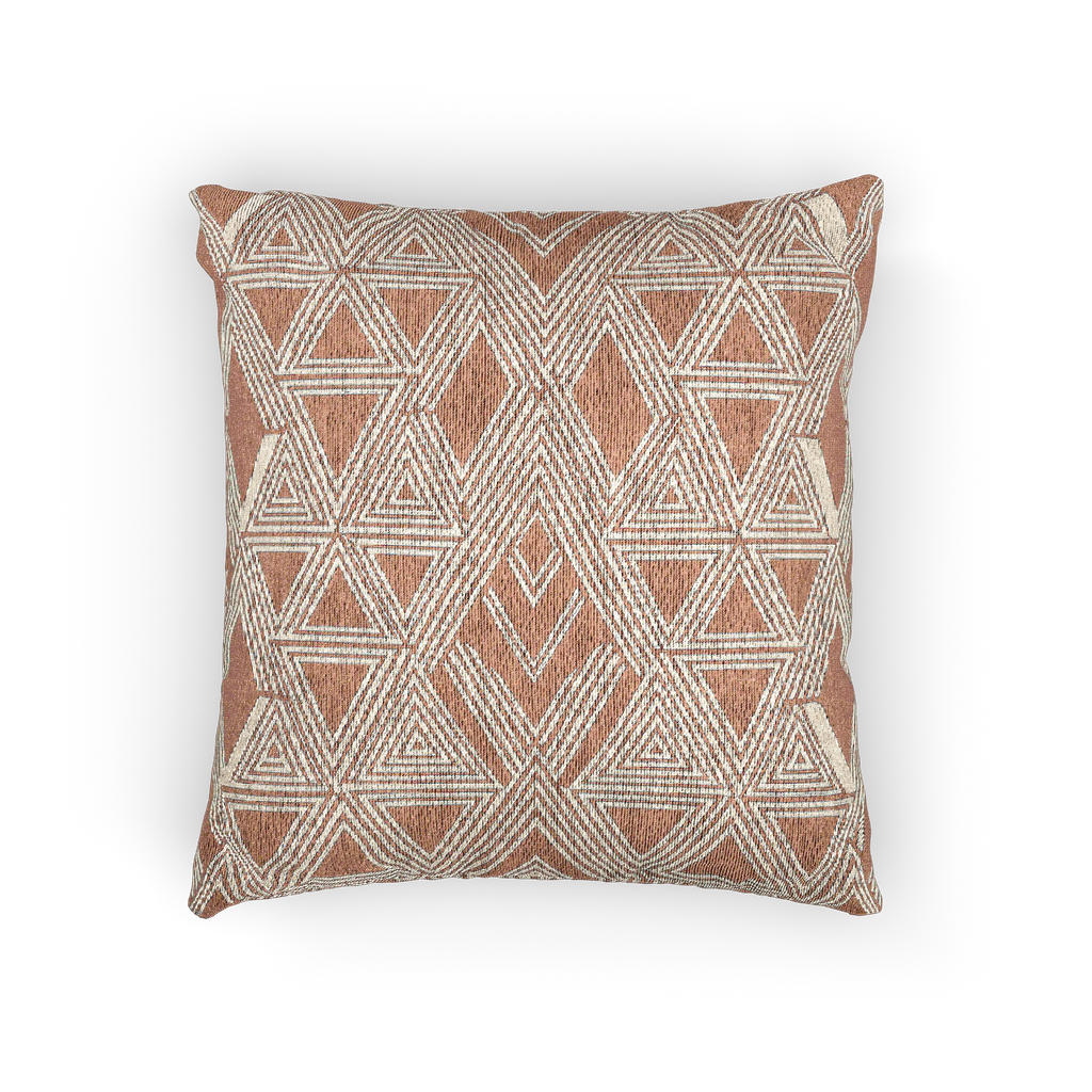 A front view of the Boho Salmon Red Geometric Woven Pillow showing a salmon background and ivory ikat geometric patterns. 