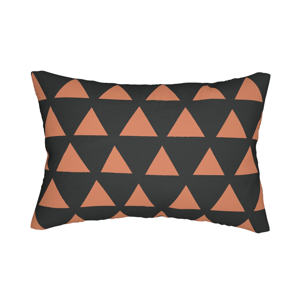 Carbon fiber boho rust geometric triangle lumbar pillow, back view.
