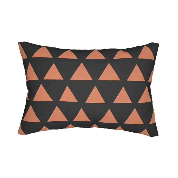 Carbon fiber boho rust geometric triangle lumbar pillow, front view.