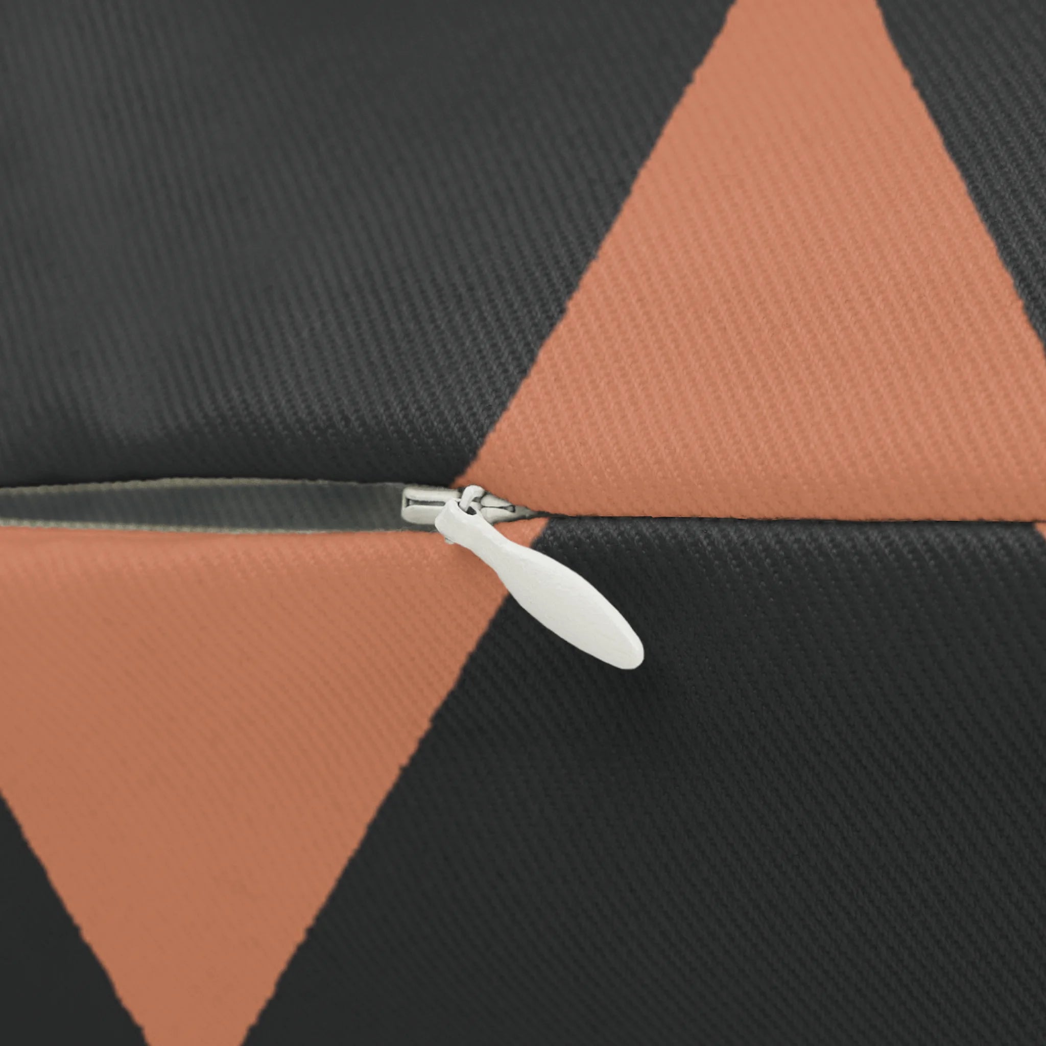 Carbon fiber boho rust geometric triangle lumbar pillow, zipper view.