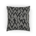 A back preview of the Carbon Fiber Ikat Modern Boho Woven Pillow showing a black carbon fiber background and ivory white chevron ikat styled lines.