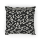 A horizontal preview of the Carbon Fiber Ikat Modern Boho Woven Pillow showing a black carbon fiber background and ivory white chevron ikat styled lines.