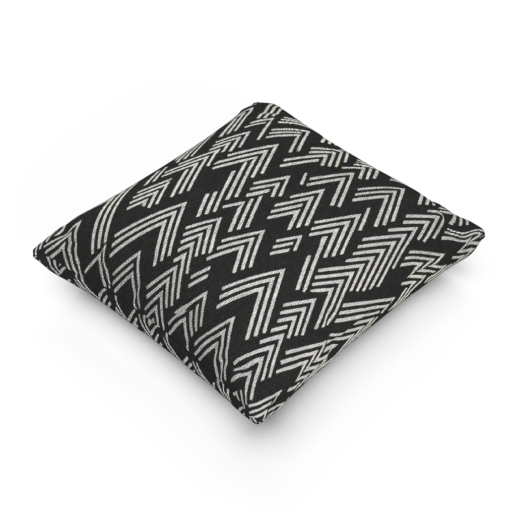 A side preview of the Carbon Fiber Ikat Modern Boho Woven Pillow showing a black carbon fiber background and ivory white chevron ikat styled lines.