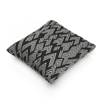 A side preview of the Carbon Fiber Ikat Modern Boho Woven Pillow showing a black carbon fiber background and ivory white chevron ikat styled lines.