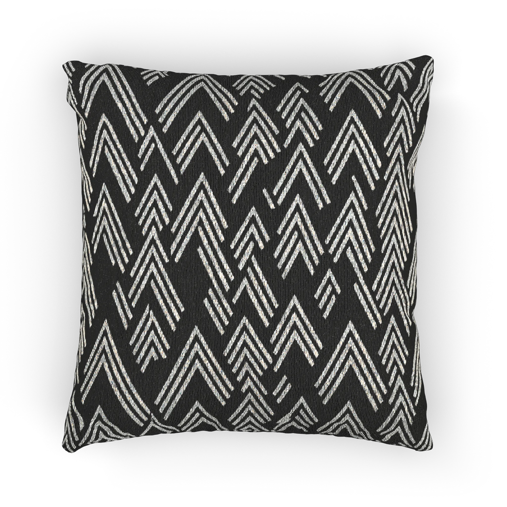 A front preview of the Carbon Fiber Ikat Modern Boho Woven Pillow showing a black carbon fiber background and ivory white chevron ikat styled lines.
