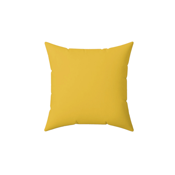 Champ yellow faux suede throw pillow, front view.